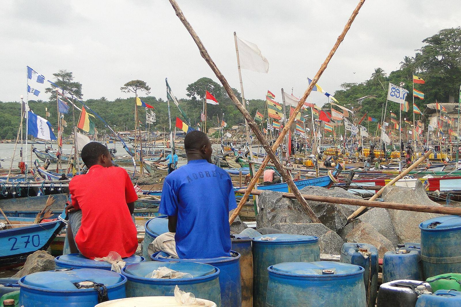 Young Men with Pirogues in Harbour - Near Busua - Ghana (4738454856)