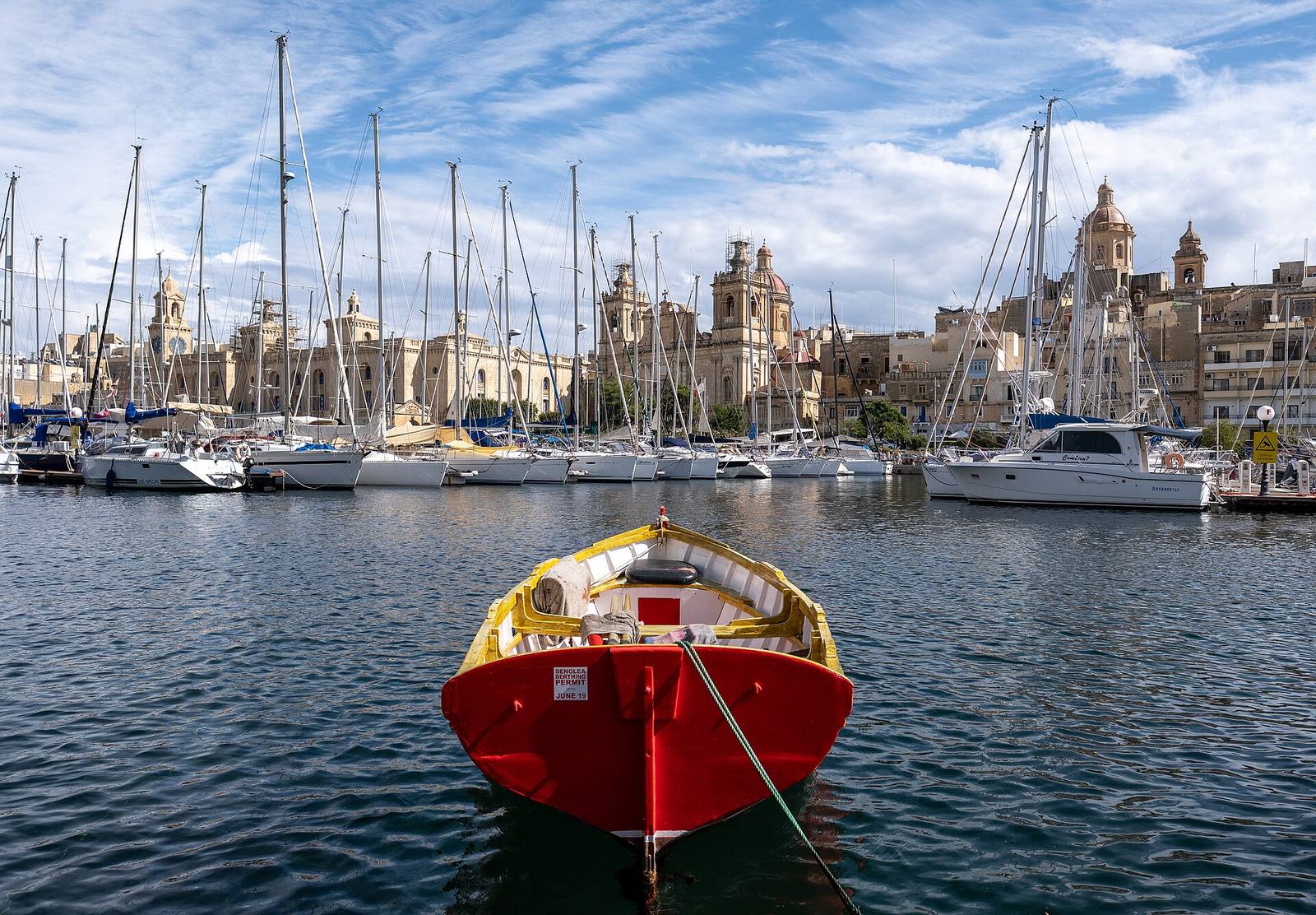 Small boat at the Senglea waterfront with Birgu in the background, Malta (PPL1-Corrected) julesvernex2