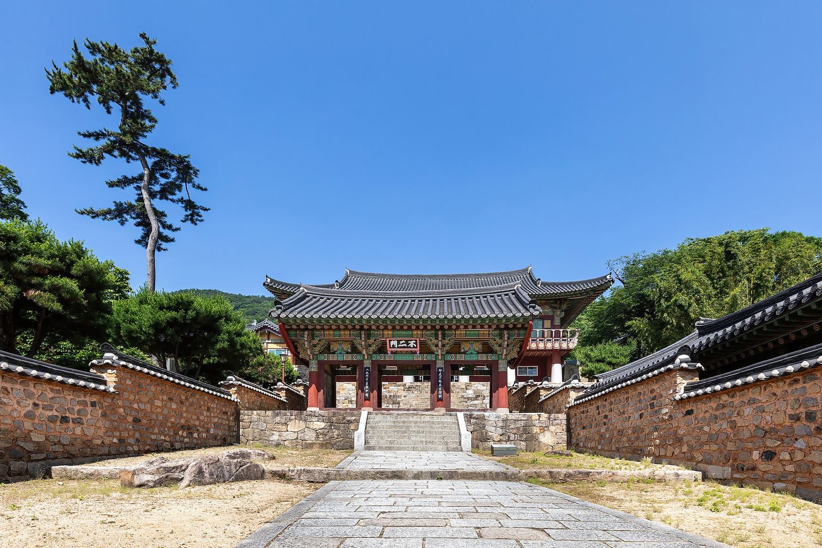 Burimun gate and pine under blue sky at Beomeosa temple in Busan, South Korea