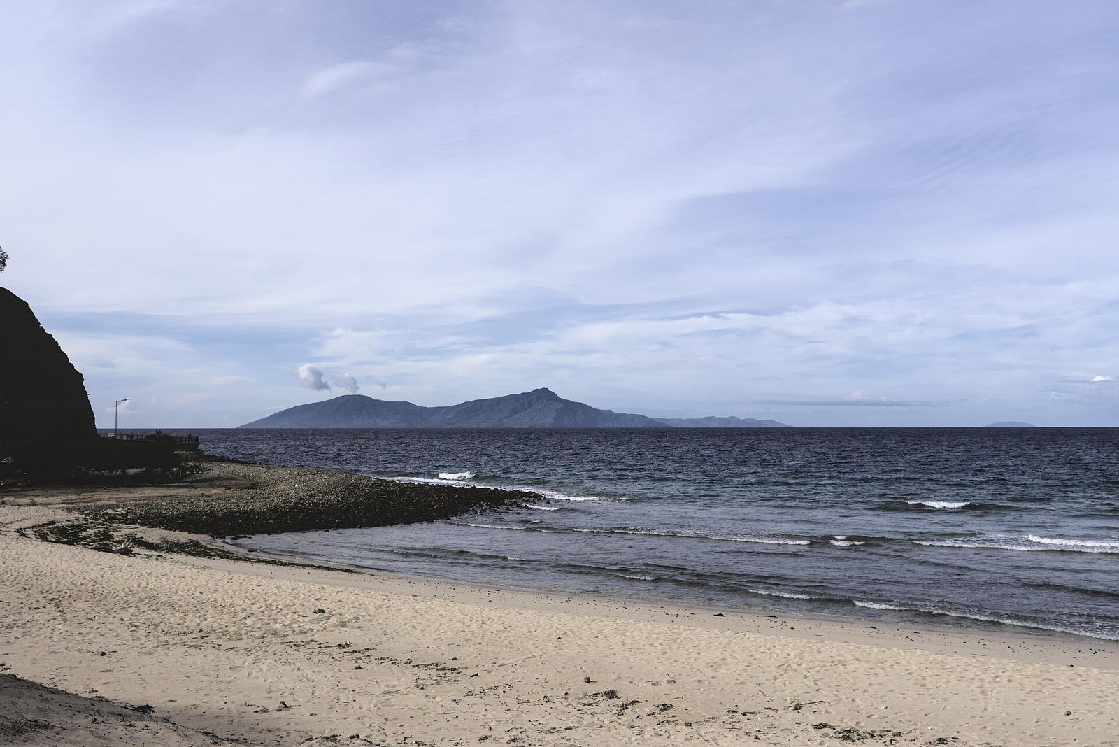 Beach behind Cristo Rei with view of Atauro Island in background
